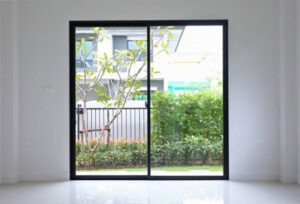 black sliding door, white walls 