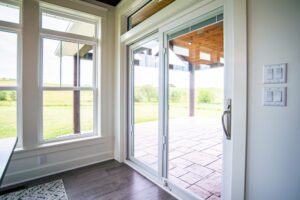 Sliding glass door with patio view.