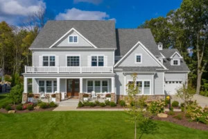 Modern suburban house with garden and front porch.