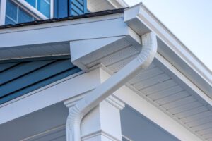 Close-up of house gutter system and soffit