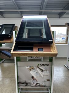 Display of Fakro roof windows in showroom.