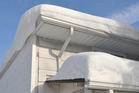 Snow on the roof gutter