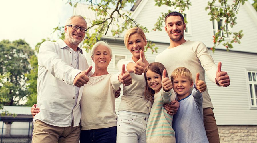 happy-family-with-approved-signed-outside-the-houe