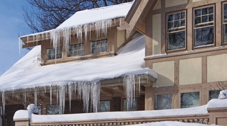 house-roof-covered-in-snow