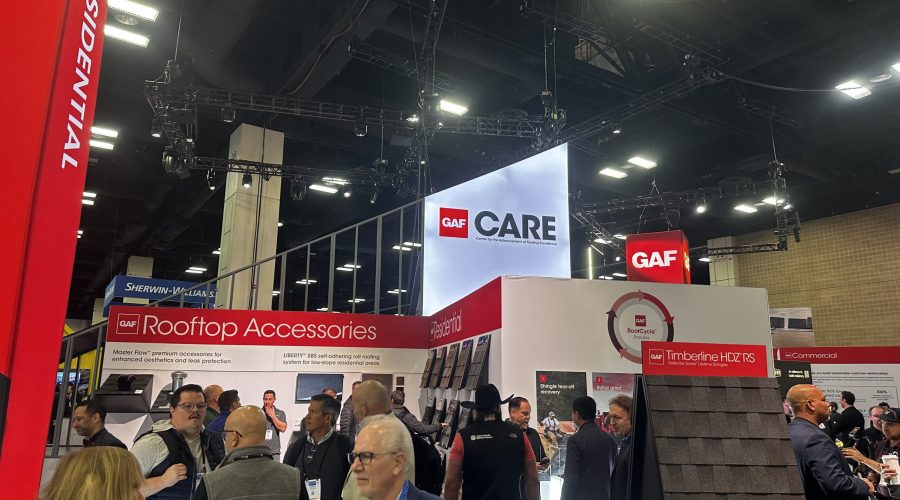GAF roofing products display at trade show.