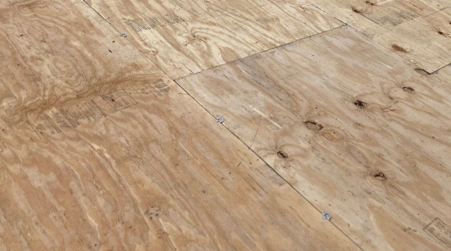 Plywood clips Close-up of plywood decking installation.